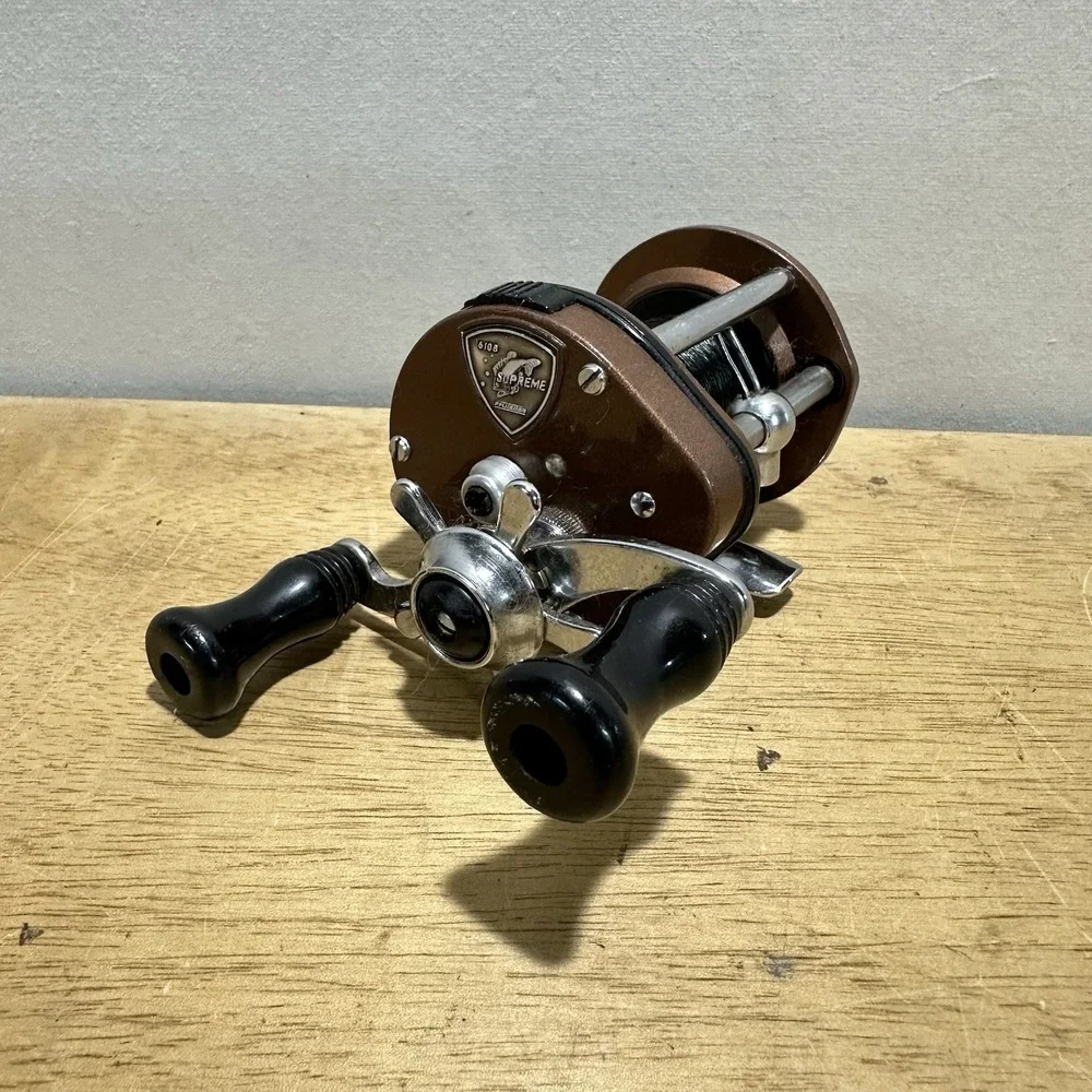 Vintage Pflueger Supreme 610B Bait Casting Fishing Reel Brown Level Wind